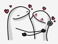 Flork and Niña hugging, surrounded by hearts